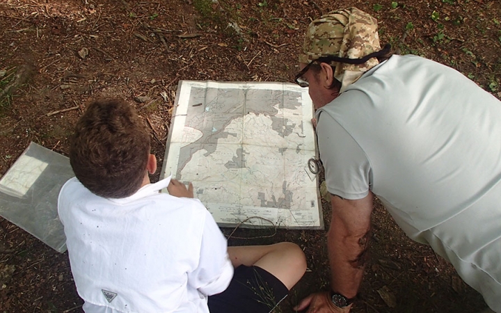 families learn navigation skills on outdoor trip